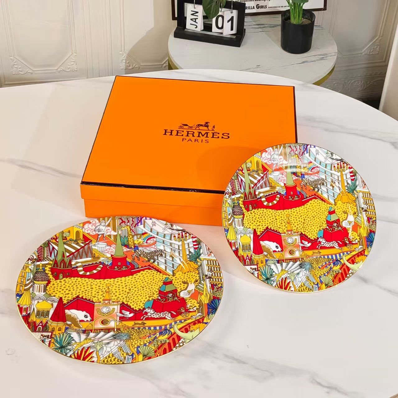 A set of porcelain plates from Hermes with a "Forest Animals" pattern. Two plates.